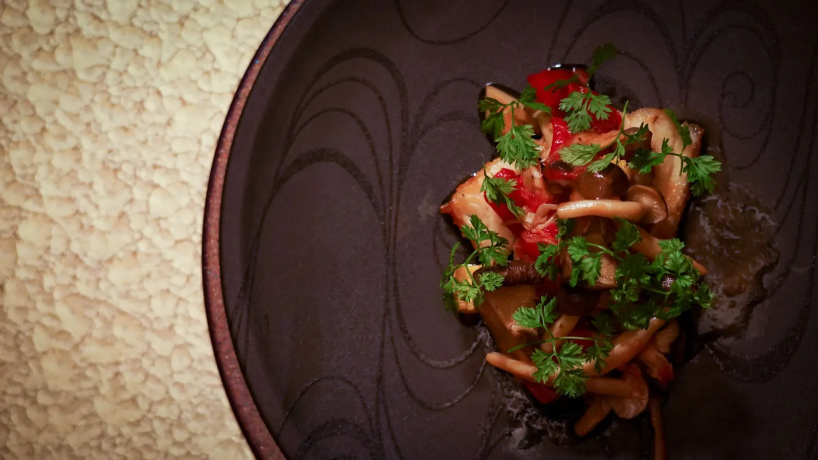 Mushrooms and tomato on an Arita-ware plate